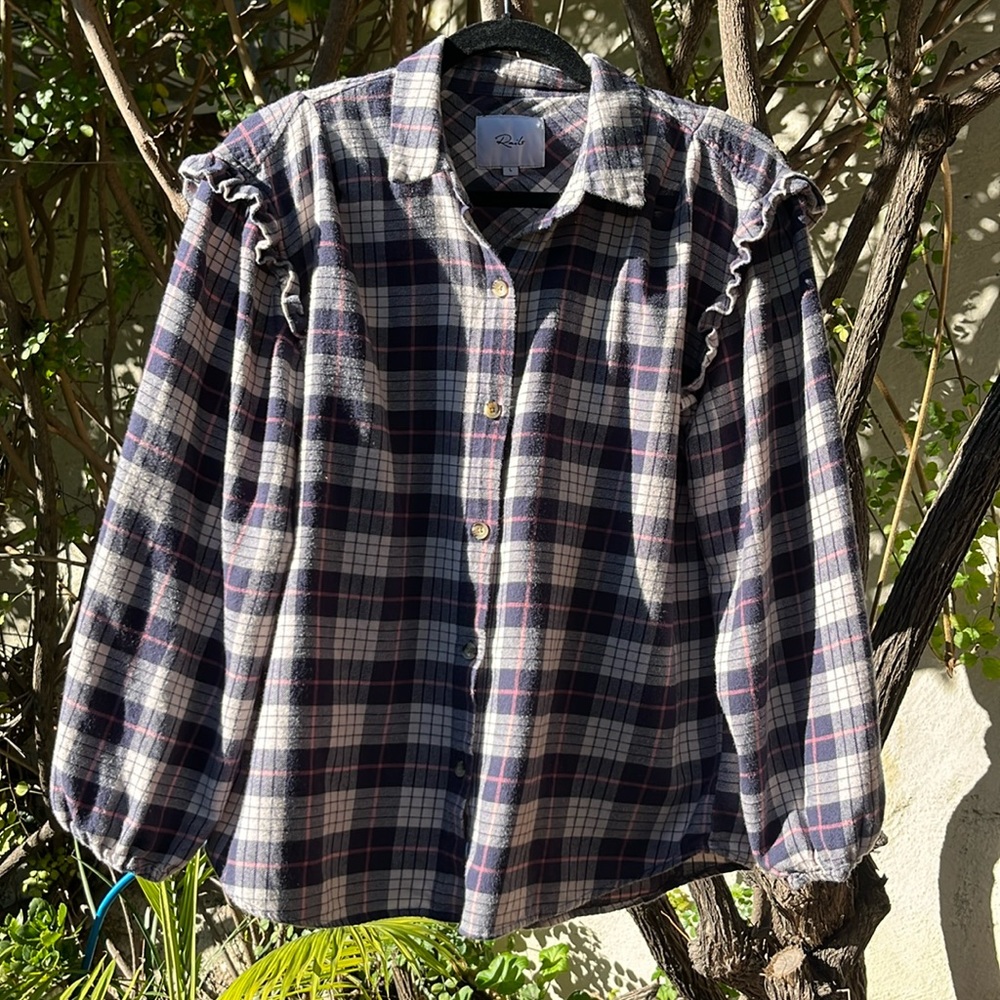 Rails navy and pink flannel with shoulder ruffles and elastic cuffs. Size L